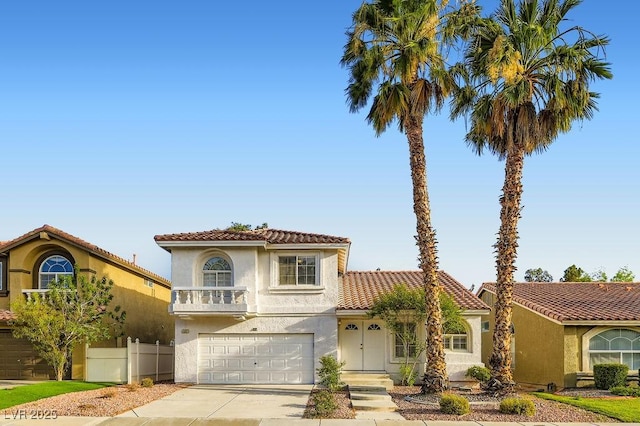 1547 Balsam Mist Ave, Las Vegas, NV 89183 - mediterranean / spanish-style house featuring concrete driveway, a garage, stucco siding, and a tile roof