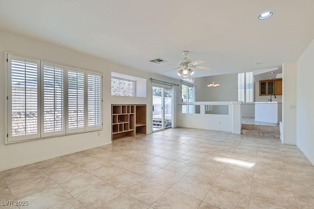 1547 Balsam Mist Ave, Las Vegas, NV 89183 - unfurnished living room featuring ceiling fan, light tile patterned flooring, and recessed lighting