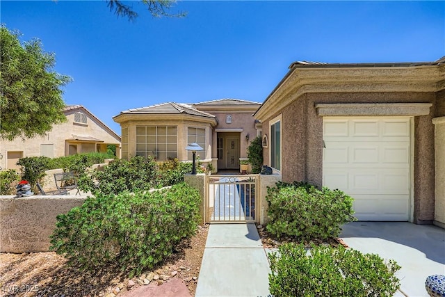 2016 Biloxi Pass, Henderson, NV 89052 - view of front of house with stucco siding, a fenced front yard, and a gate