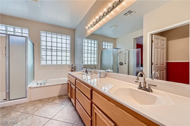 2016 Biloxi Pass, Henderson, NV 89052 - full bath featuring a stall shower, double vanity, a bath, and tile patterned floors