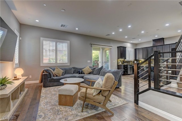 10360 Pescado Ln, Las Vegas, NV 89135 - living area featuring hardwood / wood-style flooring, stairs, and recessed lighting