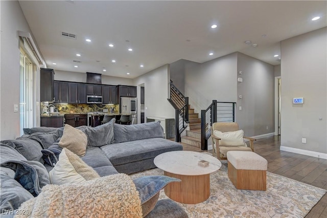 10360 Pescado Ln, Las Vegas, NV 89135 - living area with wood finished floors, recessed lighting, and stairway
