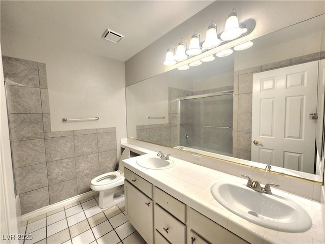 8220 Desert Beach Dr, Las Vegas, NV 89128 - full bathroom with tiled shower, tile patterned flooring, and double vanity