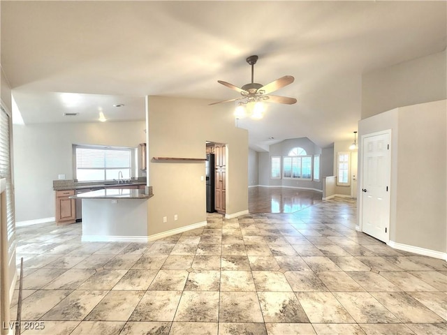 8220 Desert Beach Dr, Las Vegas, NV 89128 - unfurnished living room with lofted ceiling and a ceiling fan