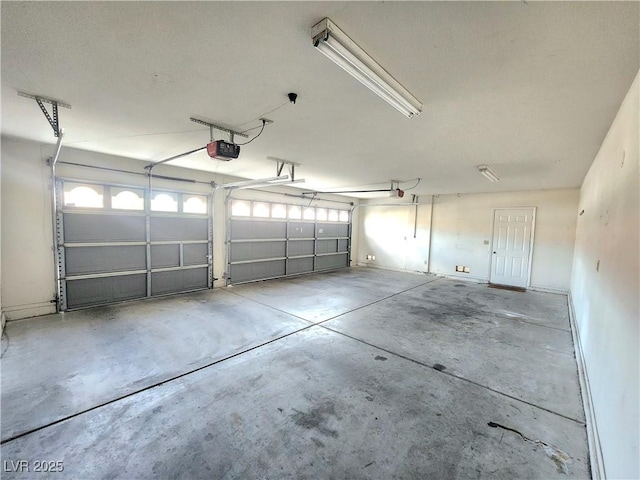8220 Desert Beach Dr, Las Vegas, NV 89128 - garage with a garage door opener