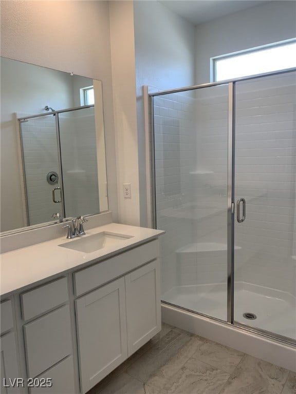 901 Heritage Bend Dr, Las Vegas, NV 89138 - full bath featuring vanity, a stall shower, and marble finish flooring