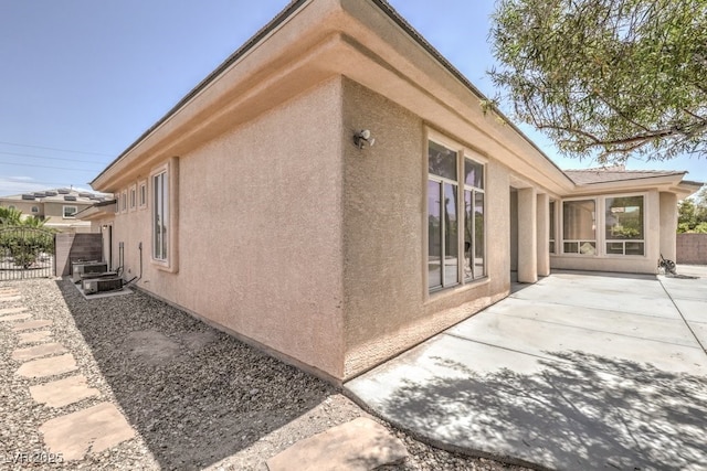 6821 Sleepy Pine St, Las Vegas, NV 89130 - view of home's exterior featuring a patio and stucco siding