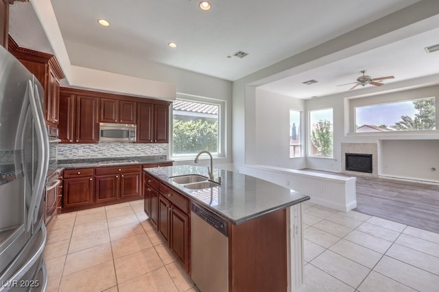 6821 Sleepy Pine St, Las Vegas, NV 89130 - kitchen featuring appliances with stainless steel finishes, light tile patterned floors, healthy amount of natural light, and recessed lighting