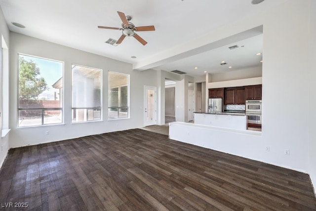 6821 Sleepy Pine St, Las Vegas, NV 89130 - unfurnished living room featuring a ceiling fan and dark wood finished floors
