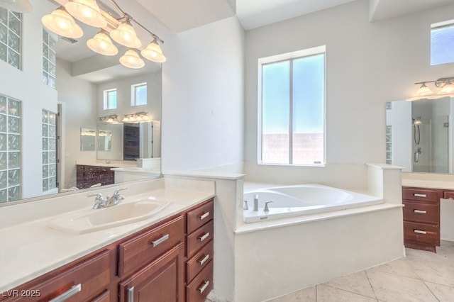 6821 Sleepy Pine St, Las Vegas, NV 89130 - full bath with vanity, a garden tub, healthy amount of natural light, and a shower with door