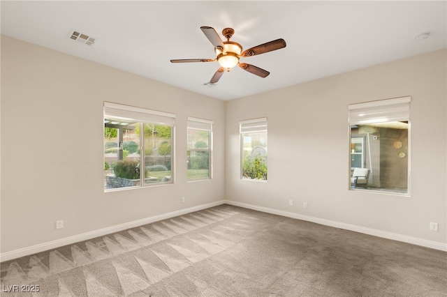 10179 Emerald Sunset Ct, Las Vegas, NV 89148 - unfurnished room featuring carpet, a ceiling fan, and a smoke detector