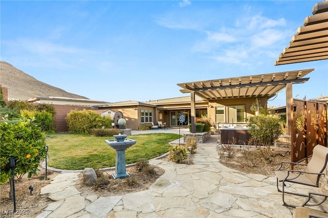 10179 Emerald Sunset Ct, Las Vegas, NV 89148 - view of patio with a hot tub and a pergola