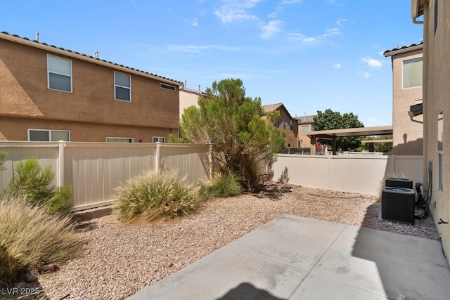 8448 Quarentina Ave, Las Vegas, NV 89149 - fenced backyard featuring a patio