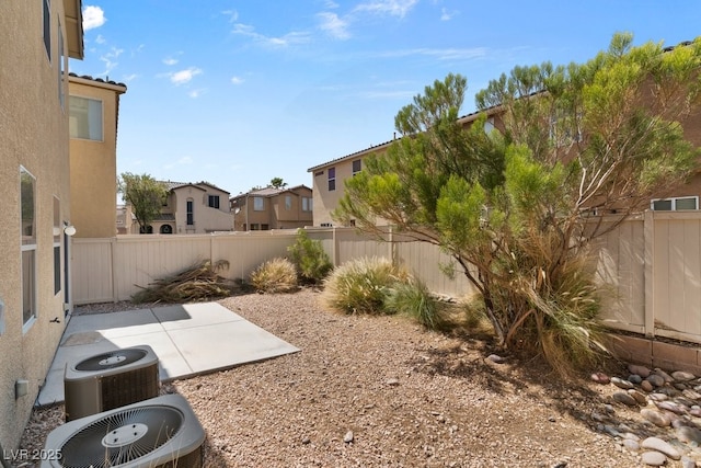 8448 Quarentina Ave, Las Vegas, NV 89149 - fenced backyard with a residential view and a patio area