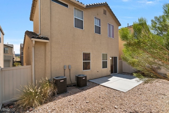 8448 Quarentina Ave, Las Vegas, NV 89149 - back of property featuring stucco siding and a patio