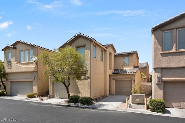 8448 Quarentina Ave, Las Vegas, NV 89149 - view of front of house with a tiled roof, stucco siding, and an attached garage