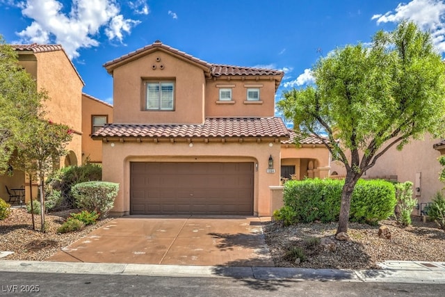 1064 Calvia St, Las Vegas, NV 89138 - mediterranean / spanish-style home with a tiled roof, an attached garage, concrete driveway, and stucco siding