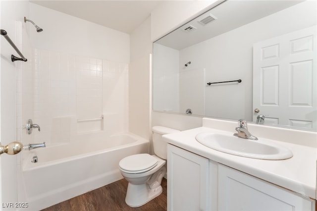 5340 Santa Fe Heights St, North Las Vegas, NV 89081 - bathroom with wood finished floors, vanity, and washtub / shower combination