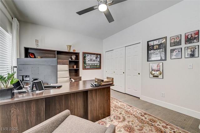 8928 Stafford Springs Dr, Las Vegas, NV 89134 - home office with a ceiling fan and wood finished floors