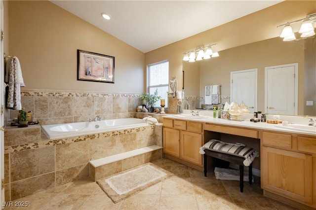 6617 Golden Bit Ave, Las Vegas, NV 89131 - full bathroom with vaulted ceiling, double vanity, and a bath