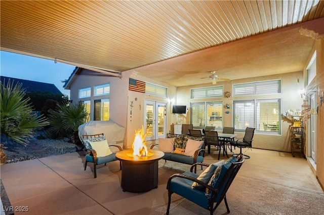 6617 Golden Bit Ave, Las Vegas, NV 89131 - view of patio / terrace with an outdoor fire pit, ceiling fan, and french doors