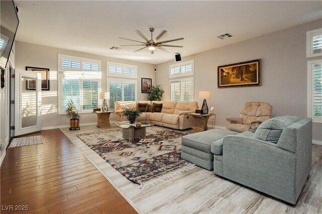 6617 Golden Bit Ave, Las Vegas, NV 89131 - living area with a ceiling fan and wood finished floors