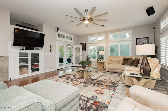6617 Golden Bit Ave, Las Vegas, NV 89131 - living room with ceiling fan, plenty of natural light, and wood finished floors