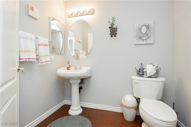 6617 Golden Bit Ave, Las Vegas, NV 89131 - half bathroom featuring toilet and baseboards