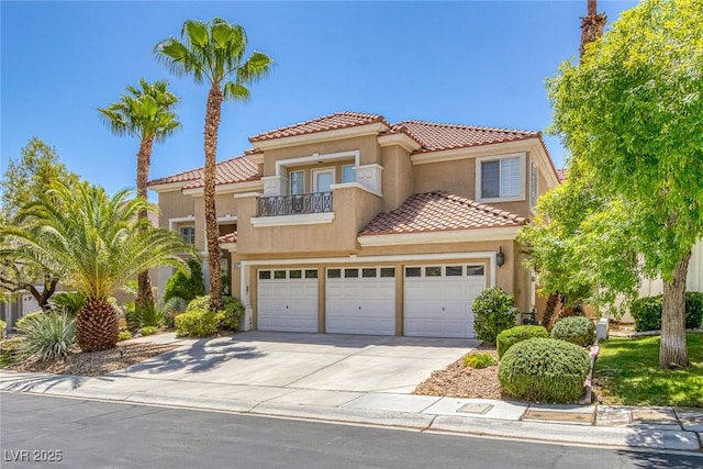 8825 Rozetta Ct, Las Vegas, NV 89134 - view of front facade with a balcony, a tiled roof, concrete driveway, and stucco siding