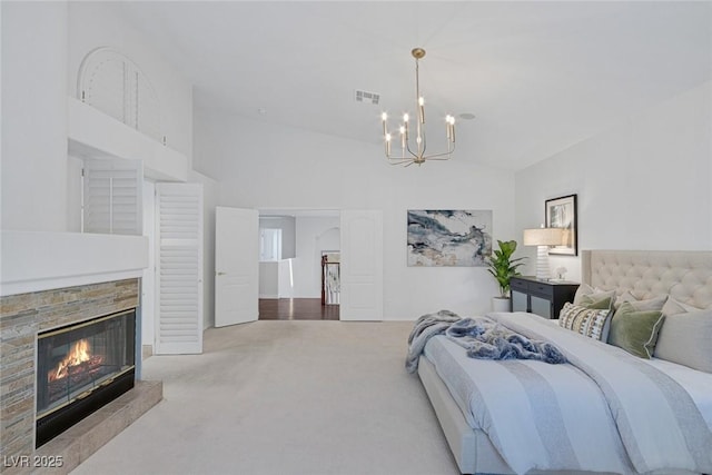 8825 Rozetta Ct, Las Vegas, NV 89134 - carpeted bedroom with a chandelier, lofted ceiling, and a stone fireplace
