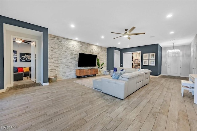 5801 Exbury Gardens Ct, Las Vegas, NV 89118 - living area featuring ceiling fan, light wood-style flooring, recessed lighting, and a chandelier