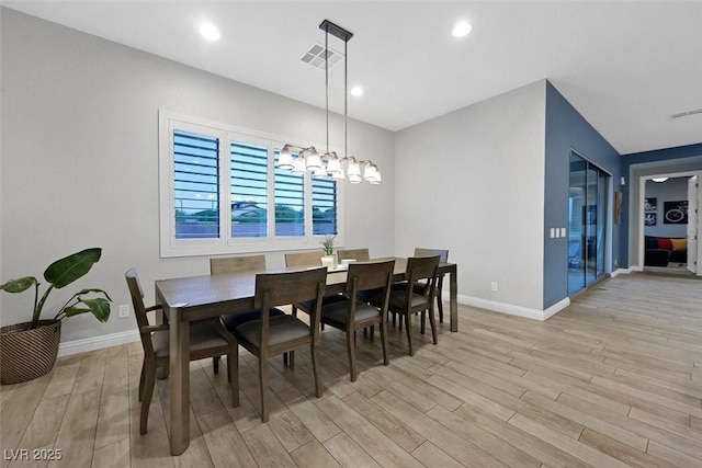 5801 Exbury Gardens Ct, Las Vegas, NV 89118 - dining room featuring light wood-type flooring, a chandelier, and recessed lighting