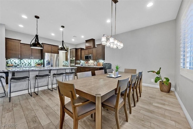 5801 Exbury Gardens Ct, Las Vegas, NV 89118 - dining room featuring light wood-type flooring and recessed lighting