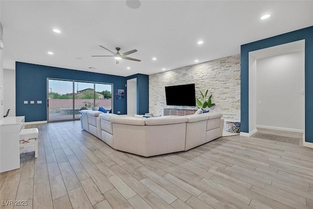 5801 Exbury Gardens Ct, Las Vegas, NV 89118 - living area featuring light wood finished floors, a ceiling fan, and recessed lighting