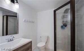 4831 Vermont Ave, Las Vegas, NV 89107 - full bath with vanity and a stall shower