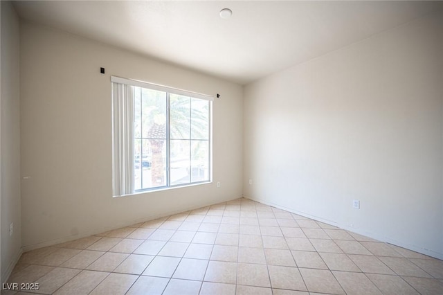 7155 S Durango Dr Unit 205, Las Vegas, NV 89113 - unfurnished room with light tile patterned floors