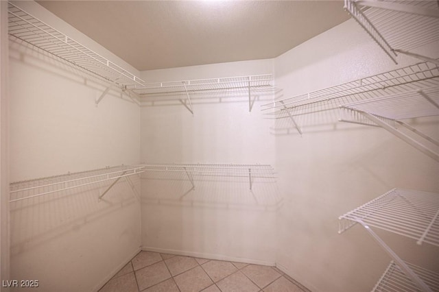 7155 S Durango Dr Unit 205, Las Vegas, NV 89113 - spacious closet with light tile patterned floors