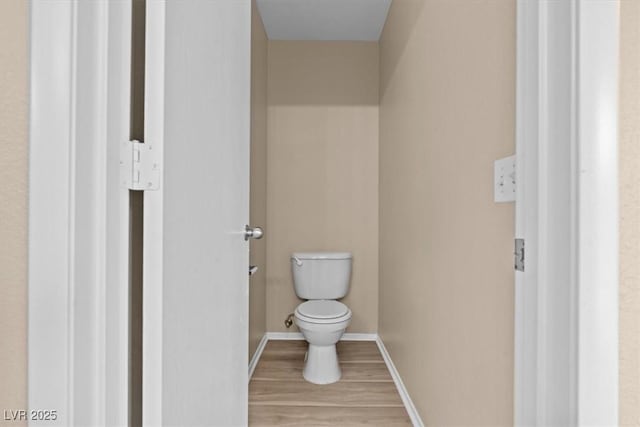 9709 Fast Elk St, Las Vegas, NV 89143 - bathroom featuring toilet and wood finished floors