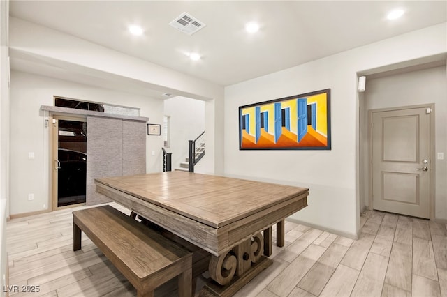 8955 Ruby Moon Dr, Las Vegas, NV 89139 - dining area with light wood-style flooring, stairway, and recessed lighting