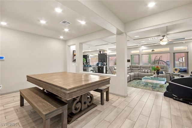 8955 Ruby Moon Dr, Las Vegas, NV 89139 - dining room with light wood-style flooring, ceiling fan, recessed lighting, beamed ceiling, and coffered ceiling