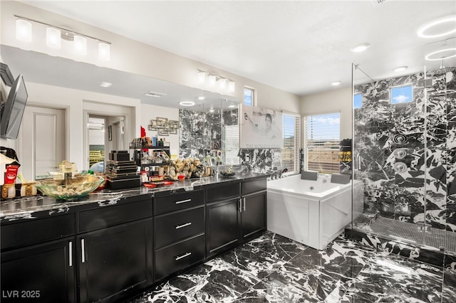 8955 Ruby Moon Dr, Las Vegas, NV 89139 - full bath with marble finish flooring, a shower stall, a tub with jets, and vanity