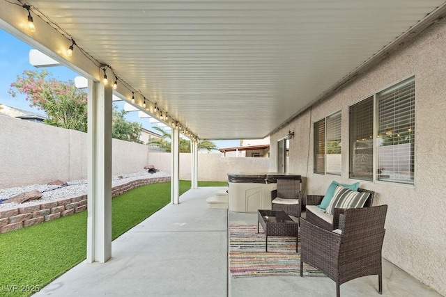 5108 Molveno Ct, Las Vegas, NV 89130 - fenced backyard with a hot tub and a patio