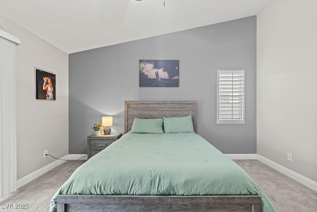 5108 Molveno Ct, Las Vegas, NV 89130 - carpeted bedroom with baseboards and vaulted ceiling