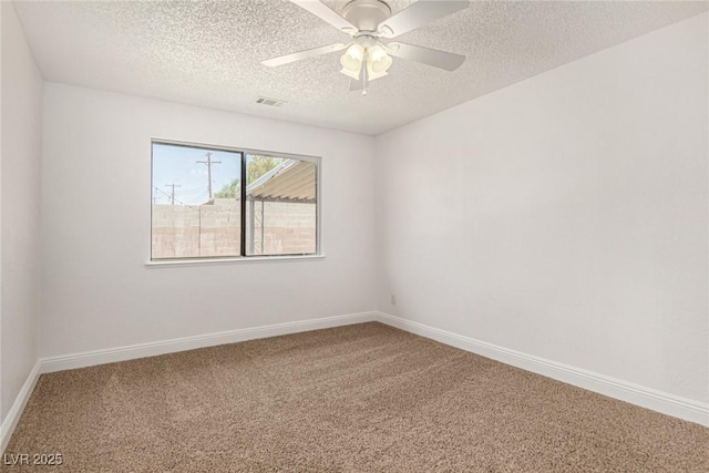5734 Duval Dr, Las Vegas, NV 89156 - carpeted spare room with a textured ceiling and ceiling fan