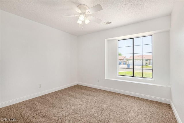 5734 Duval Dr, Las Vegas, NV 89156 - unfurnished room featuring carpet floors, a textured ceiling, and ceiling fan