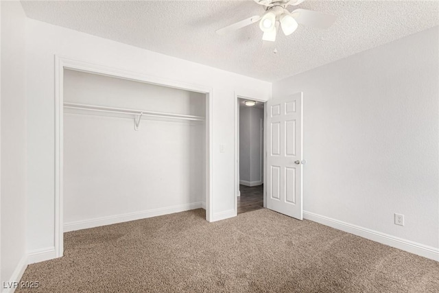 5734 Duval Dr, Las Vegas, NV 89156 - unfurnished bedroom with a textured ceiling, carpet floors, a closet, and ceiling fan