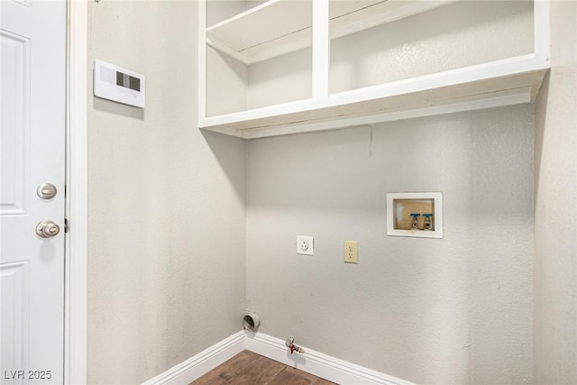 5734 Duval Dr, Las Vegas, NV 89156 - laundry room with gas dryer hookup, dark wood-type flooring, hookup for an electric dryer, and hookup for a washing machine