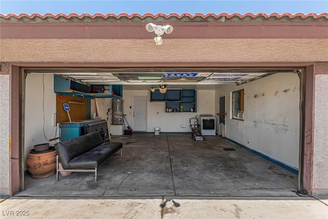 5734 Duval Dr, Las Vegas, NV 89156 - garage featuring strapped water heater