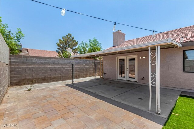 5734 Duval Dr, Las Vegas, NV 89156 - view of patio / terrace with french doors