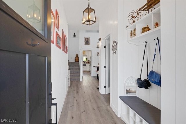 1246 Diamond Valley St, Henderson, NV 89052 - mudroom featuring light wood-type flooring and arched walkways